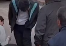 Presidente de la Corte es captado mientras personal limpia su calzado antes de ceremonia